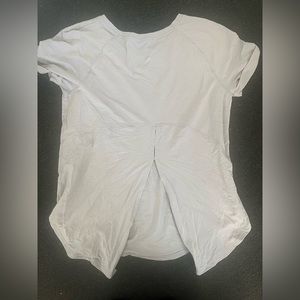 Lululemon short sleeve top. Greyish lavender size. Unknown size I think 4/6.